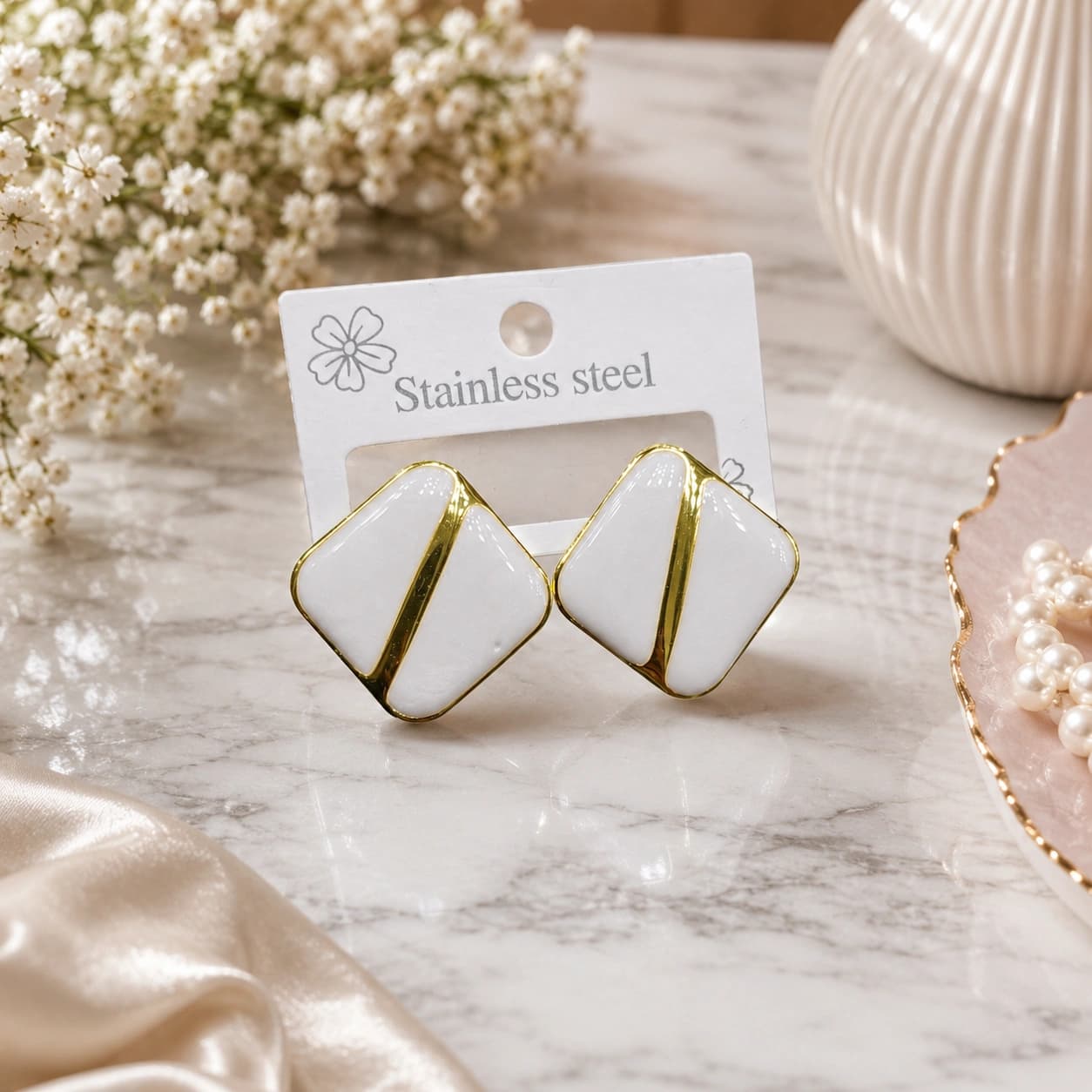 Celeste Ivory Gold Geometric Stud Earrings imitation Earrings by Soni De Nakhre