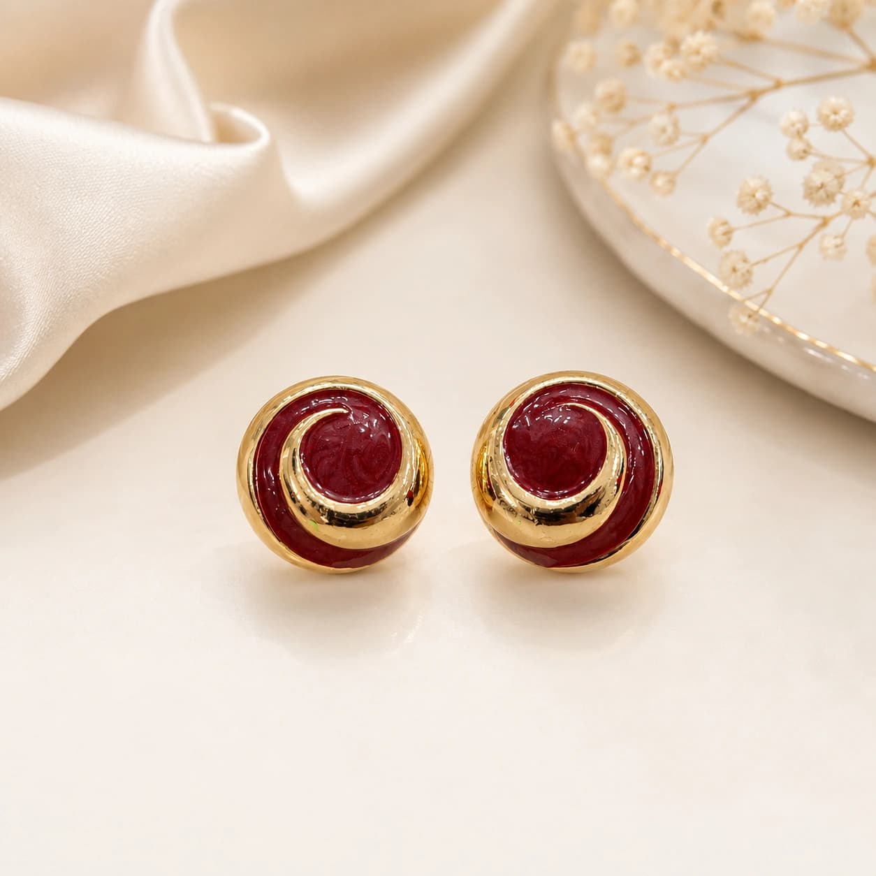 Celeste Burgundy Gold Spiral Stud Earrings imitation Earrings by Soni De Nakhre