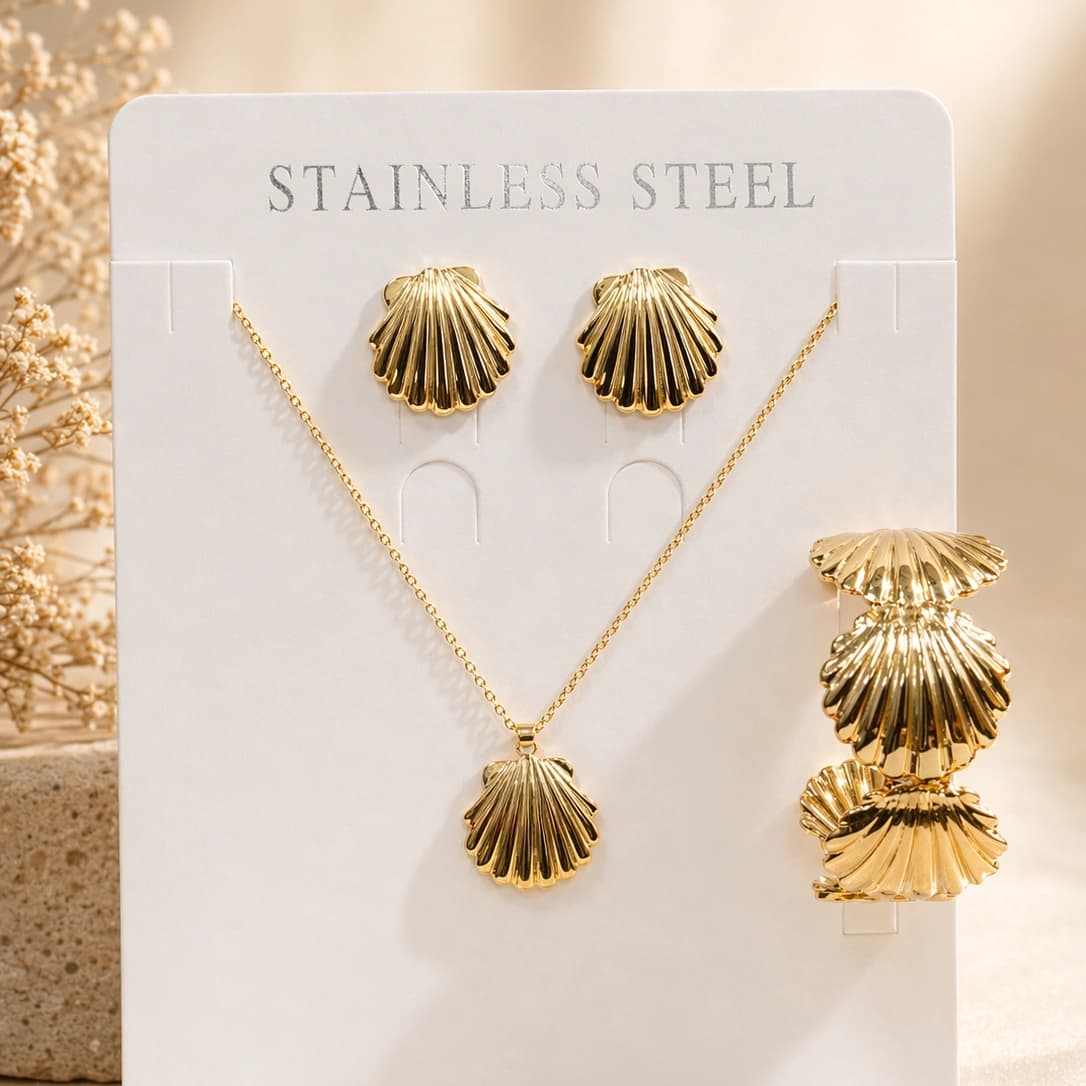 Celeste Golden Shell Necklace, Earrings & Bracelet Set imitation Sets by Soni De Nakhre