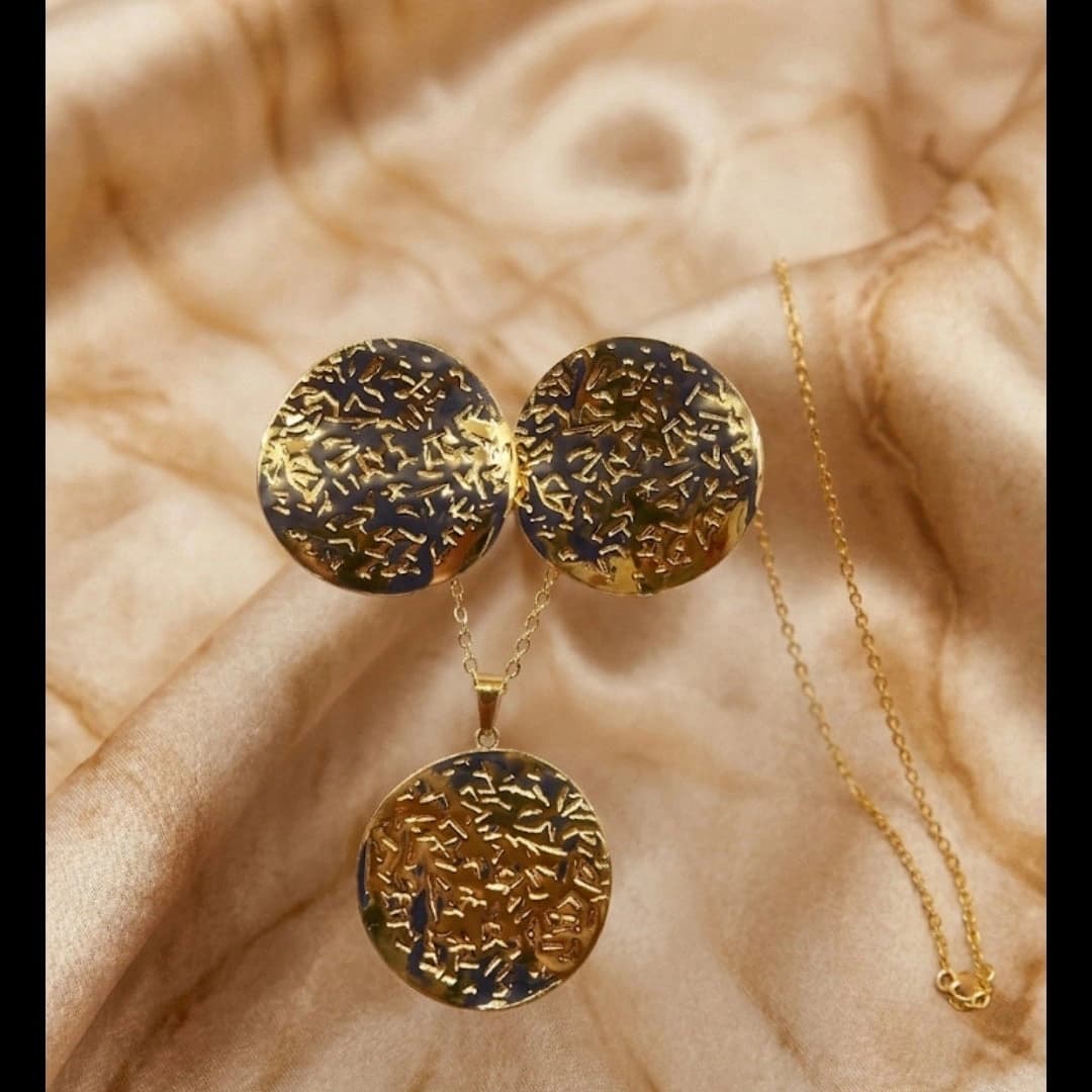 Celeste Black & Gold Textured Disc Necklace & Earrings Set imitation Sets by Soni De Nakhre