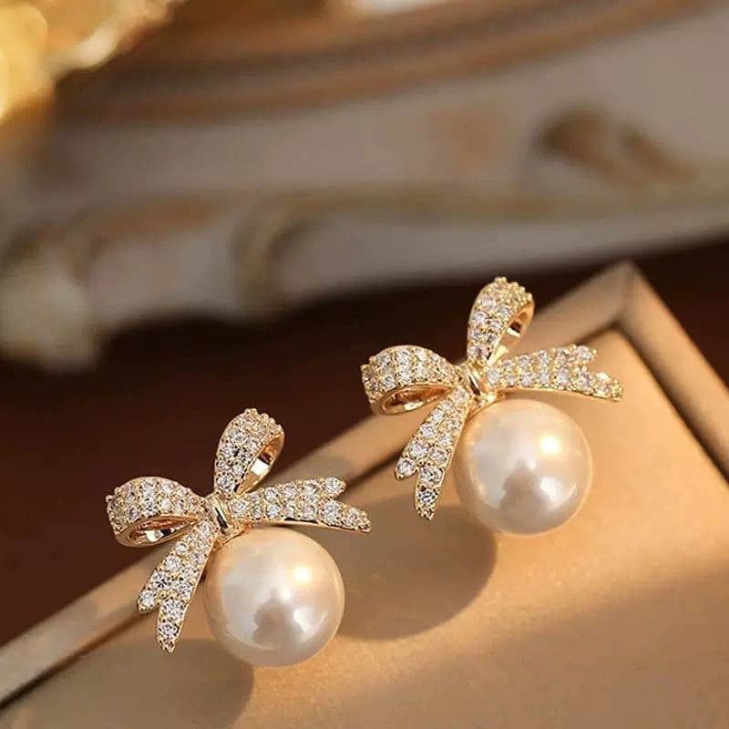 Celeste Crystal Bow Pearl Drop Korean Earrings imitation Earrings by Soni De Nakhre